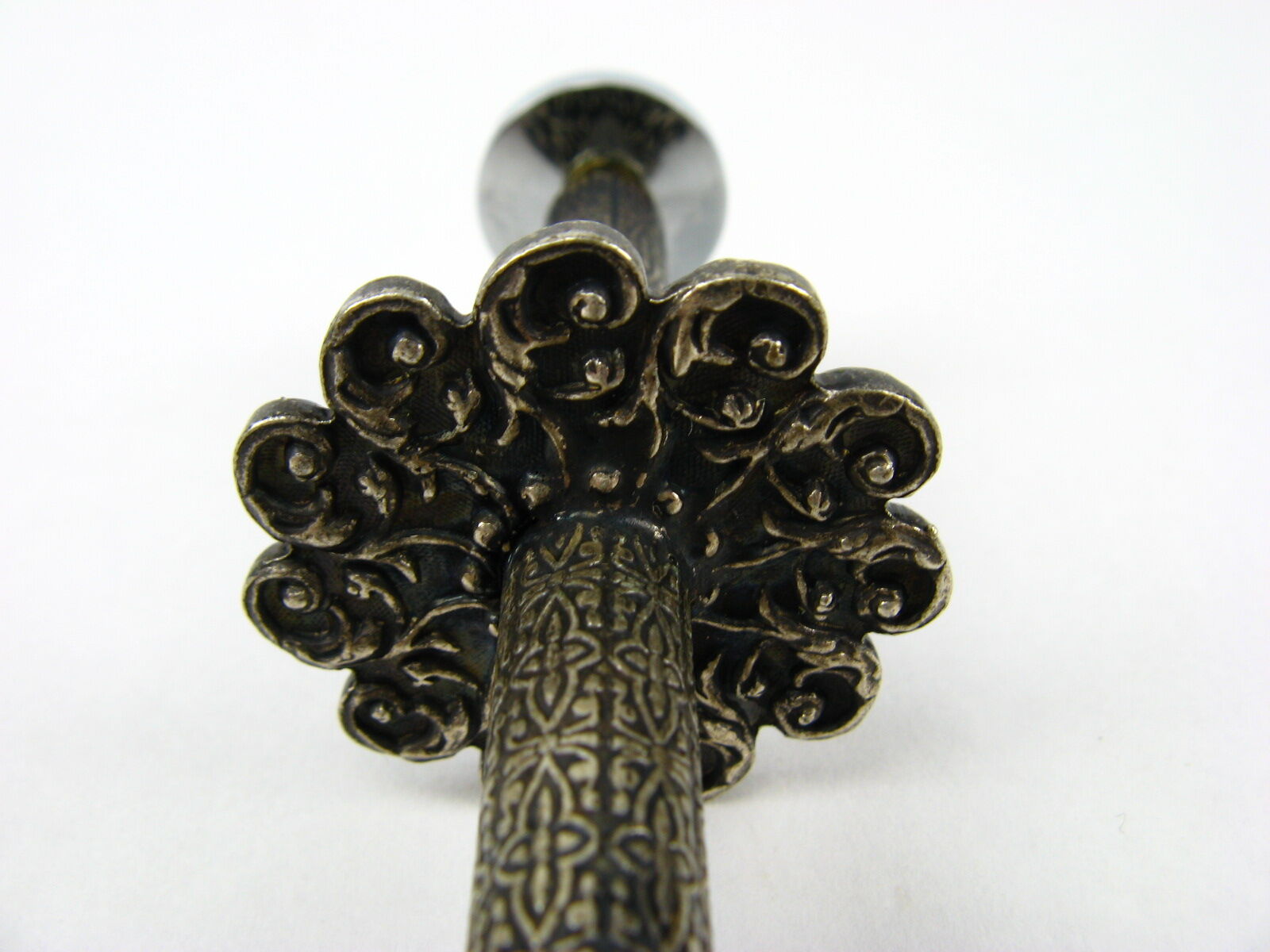 Sugar tongs in its case