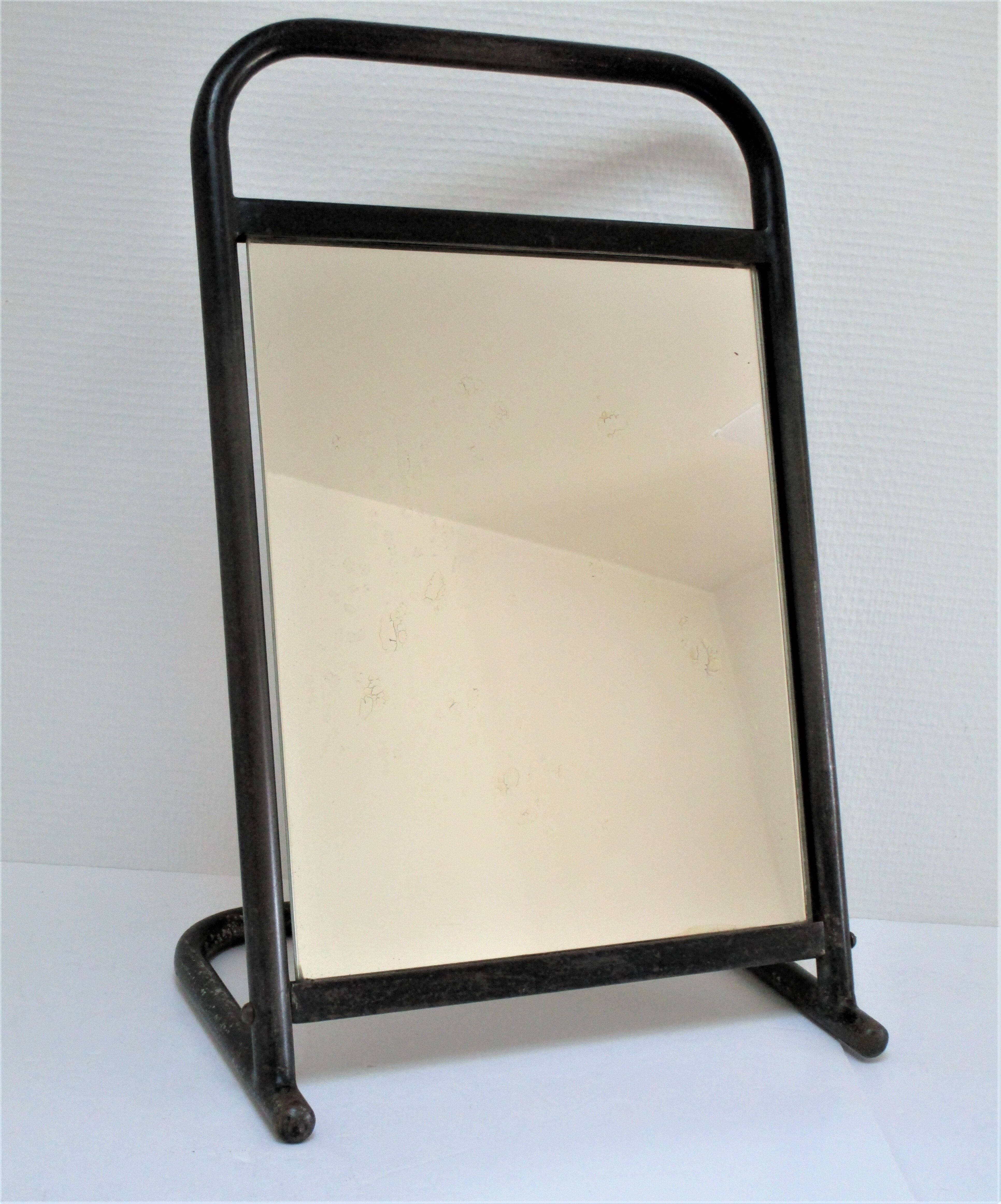 Vintage patinated metal shoe mirror