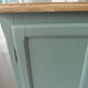 Vintage shoe cabinet smoked green wax finish, wooden top.
