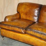 Howard & Son restored leather canapé, width 145 cm
