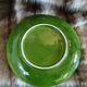Antique cup and saucer in slipware.