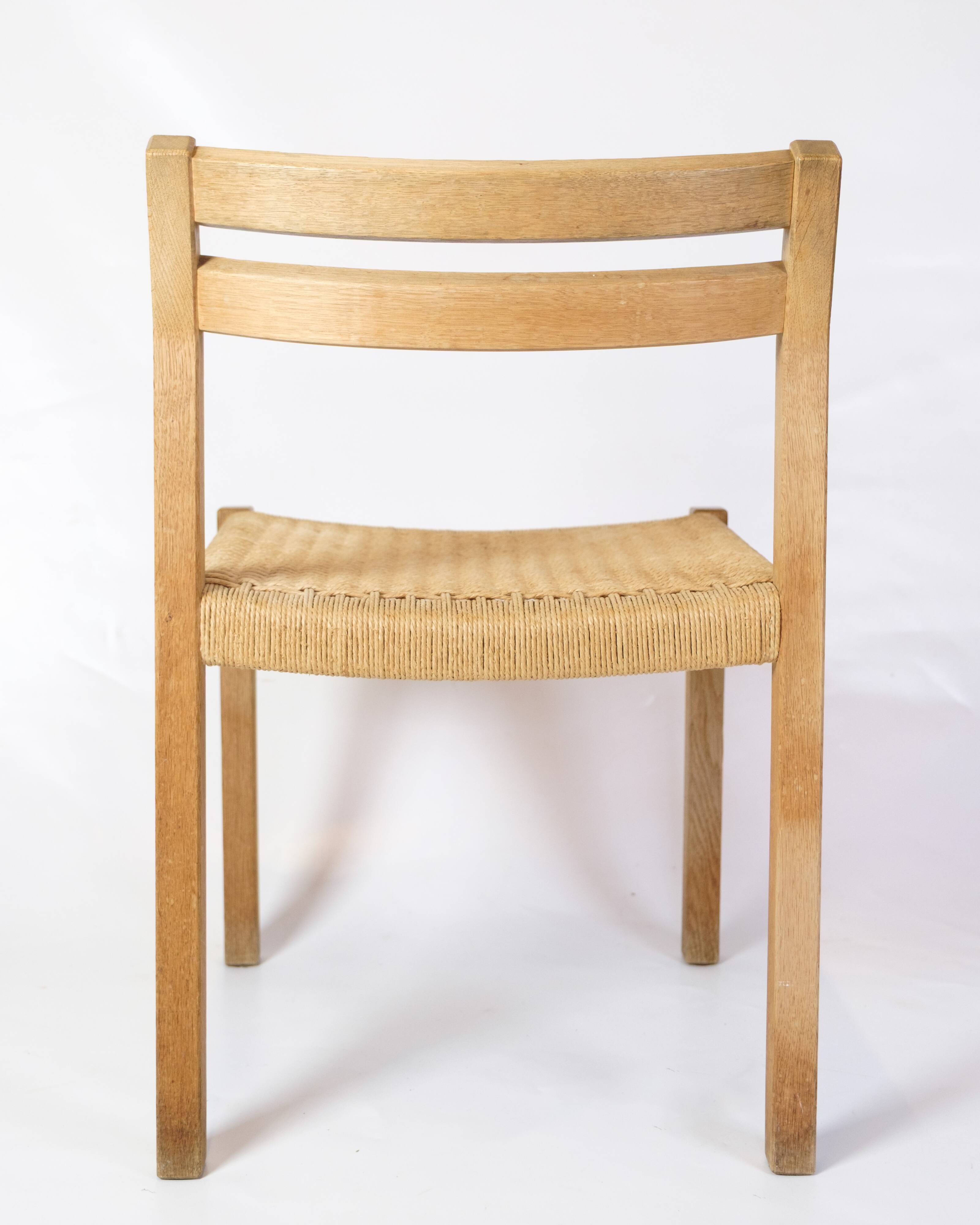 Ensemble de cinq chaises de salle à manger modèle 401 en chêne par Jørgen H. Møller