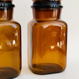 Pair of vintage amber glass jars