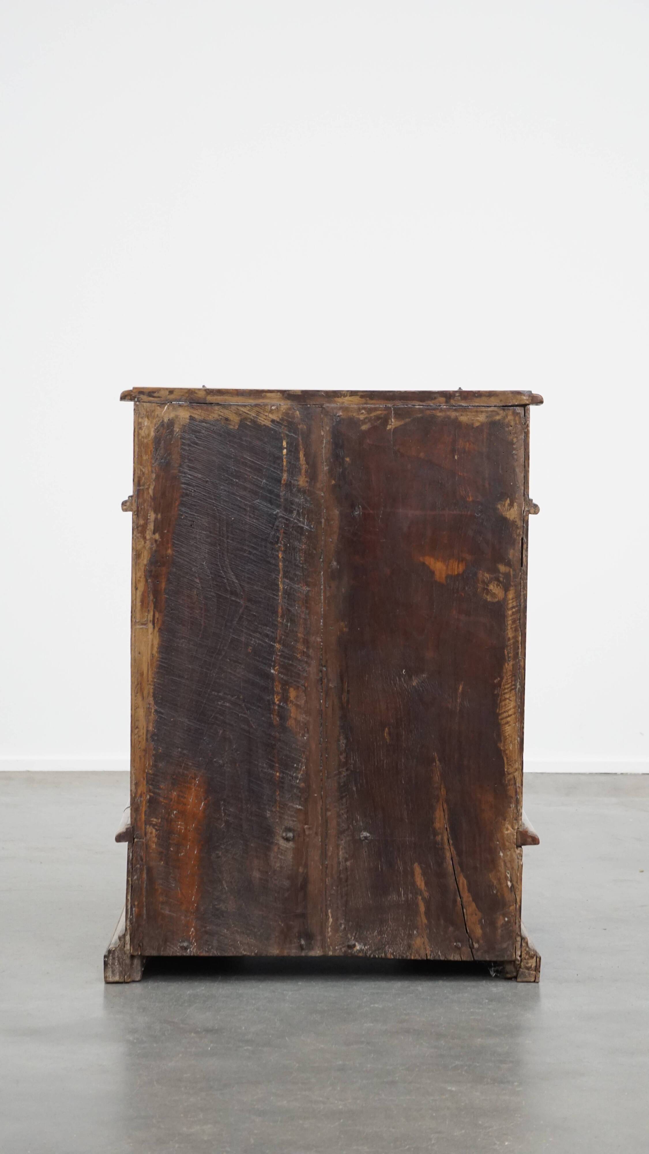 Antique pinewood church pew with storage compartments from the 18th century