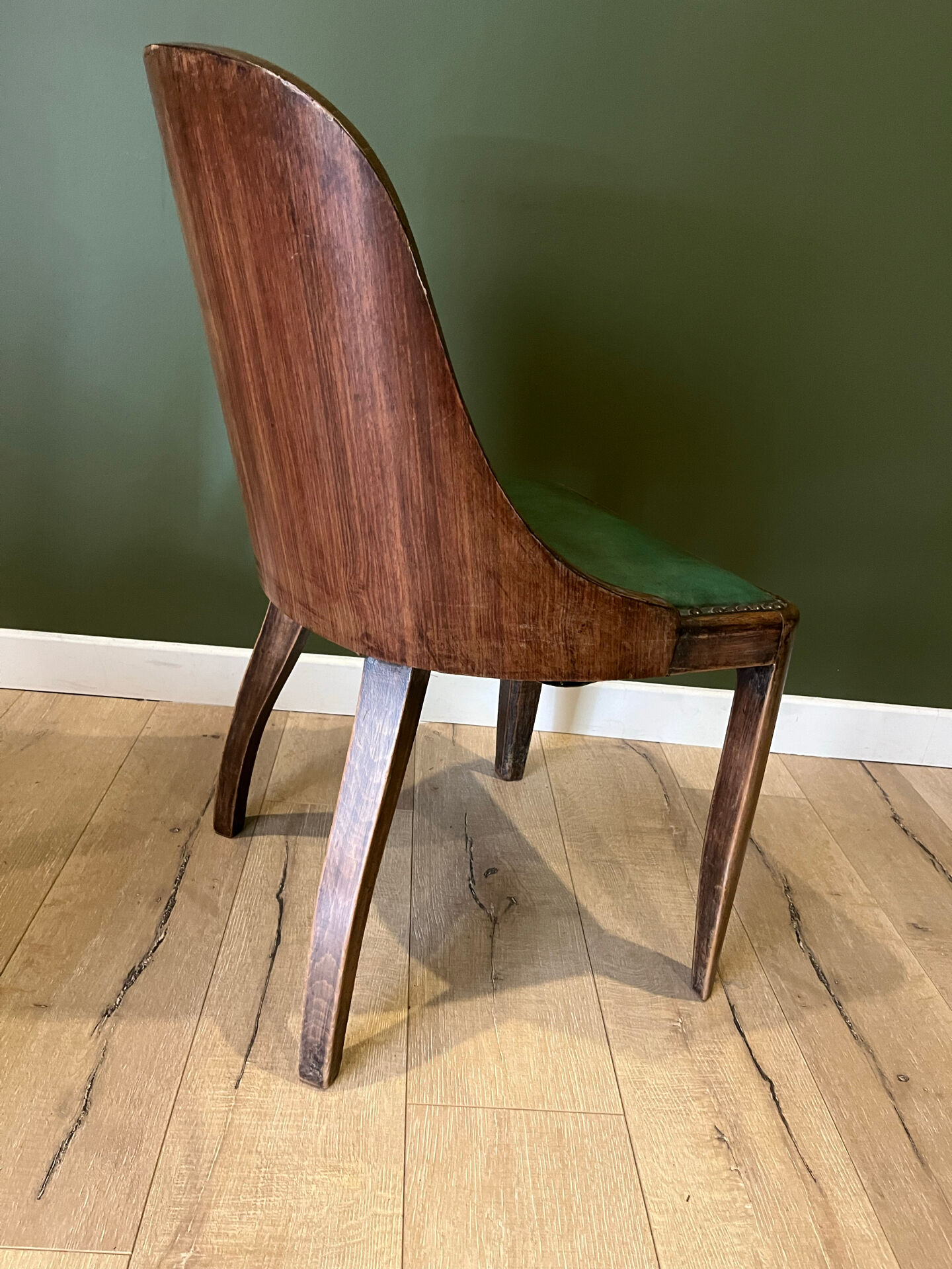 Pair of green leather gondola chairs Art Deco by De Coen