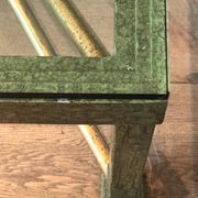 Importante table basse en acier et fer forgé patinée et dorée