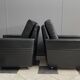 2 Black leather arm chairs 1960s on wheels