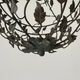 Patinated metal ceiling light with a floral and leaf pattern, 1950s, Italy.