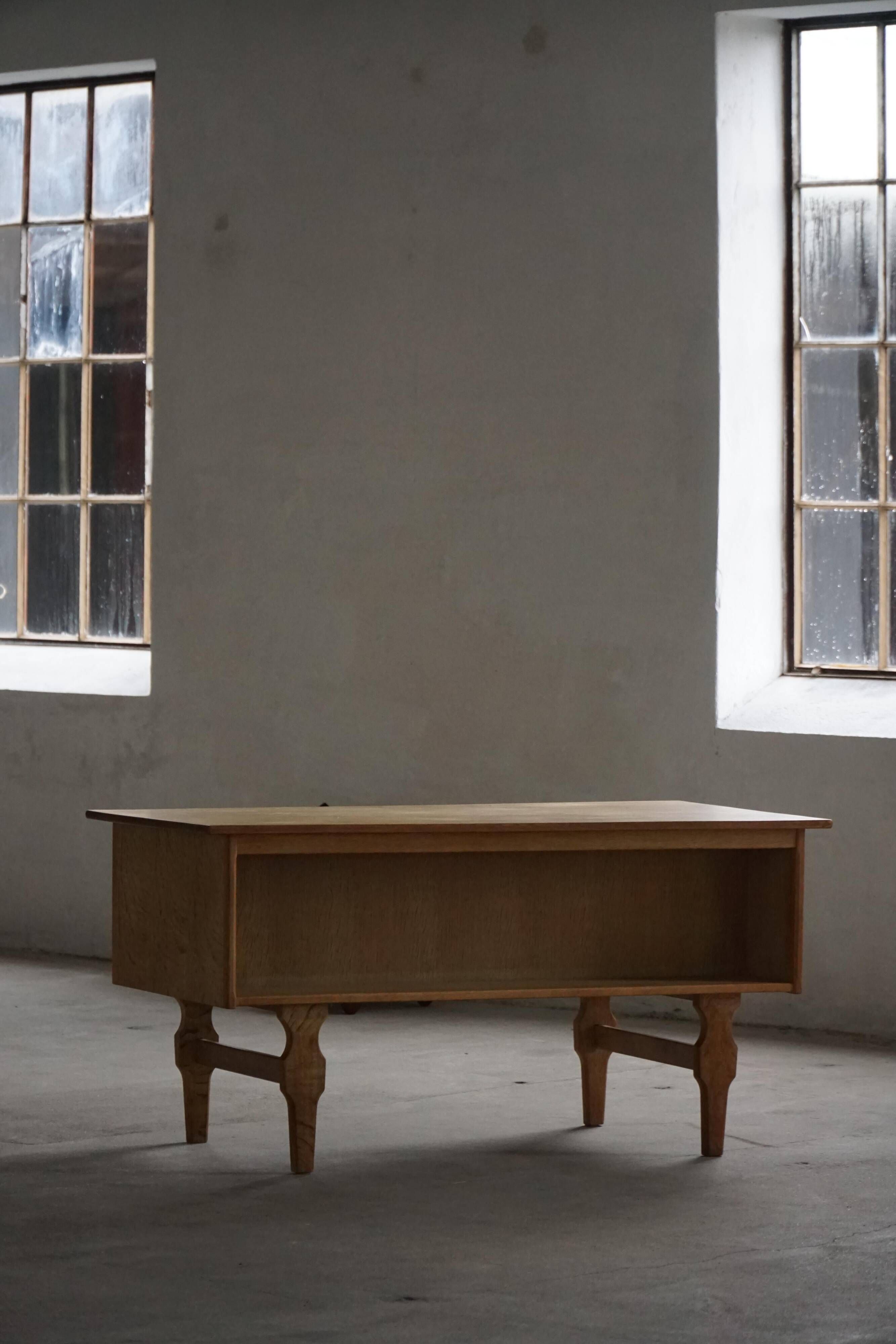 Free-standing oak desk by Henning Kjærnulf, mid-century Danish modernism, 1950s.
