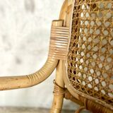 Rocking-chair en rotin et cannage