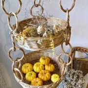 Large wicker suspension with three baskets, twisted ring chain.