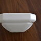 White ceramic wall soap holder