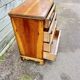Small English chest of drawers with a folding top.