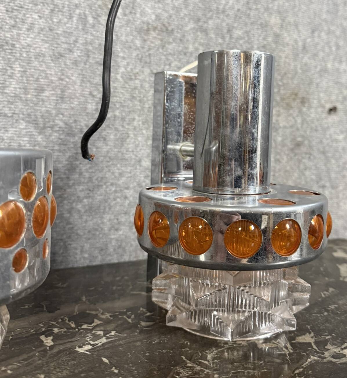 Two vintage space age pendant lamps by Raak, 1970