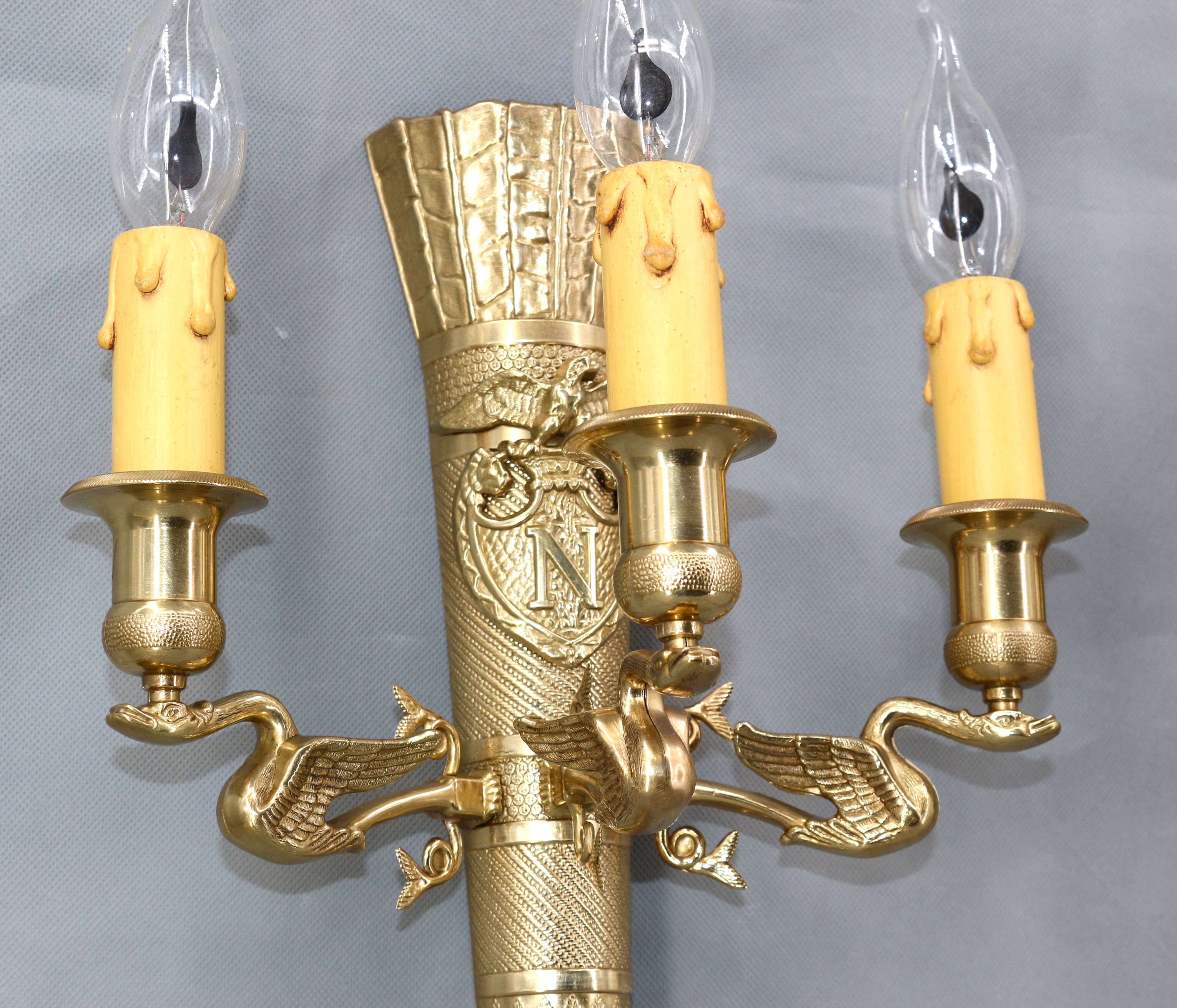 Large pair of Napoleonic gilt bronze empire style wall lights with three candles