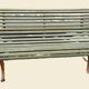 Antique Garden Bench with Wooden Slats and Iron Legs