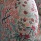 pair of toad armchairs in floral fabric.