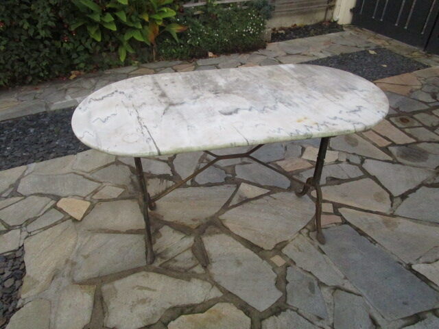 Antique marble bistro table and cast iron foot