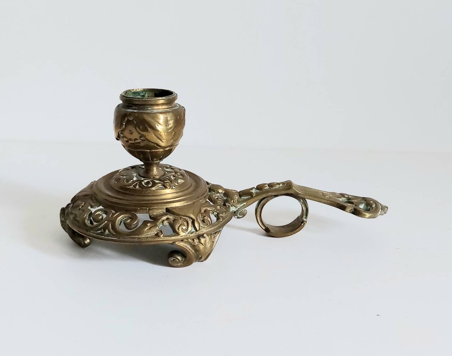 "Cave rat" brass candlestick