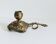 "Cave rat" brass candlestick
