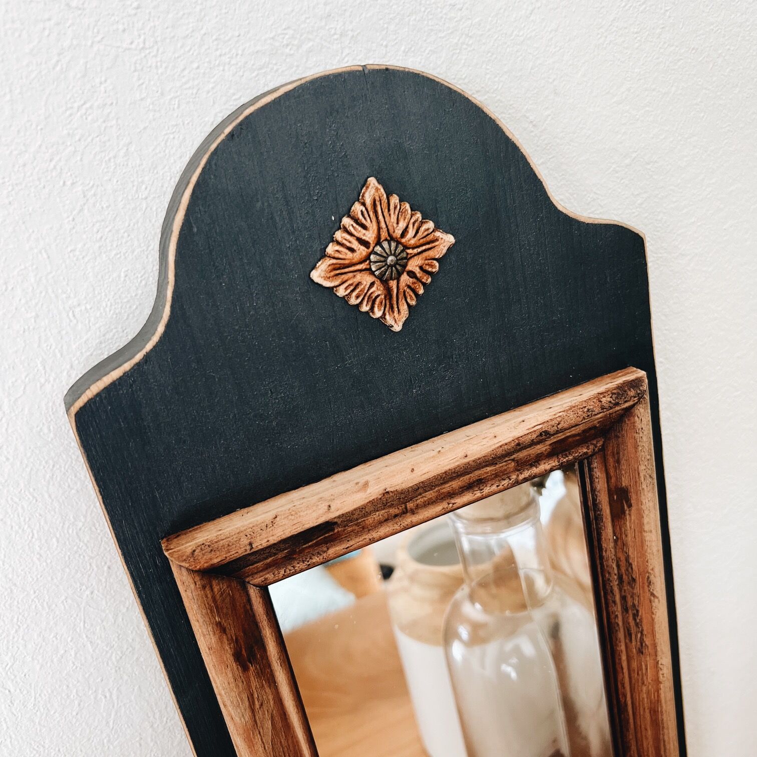 Wooden and black mirror