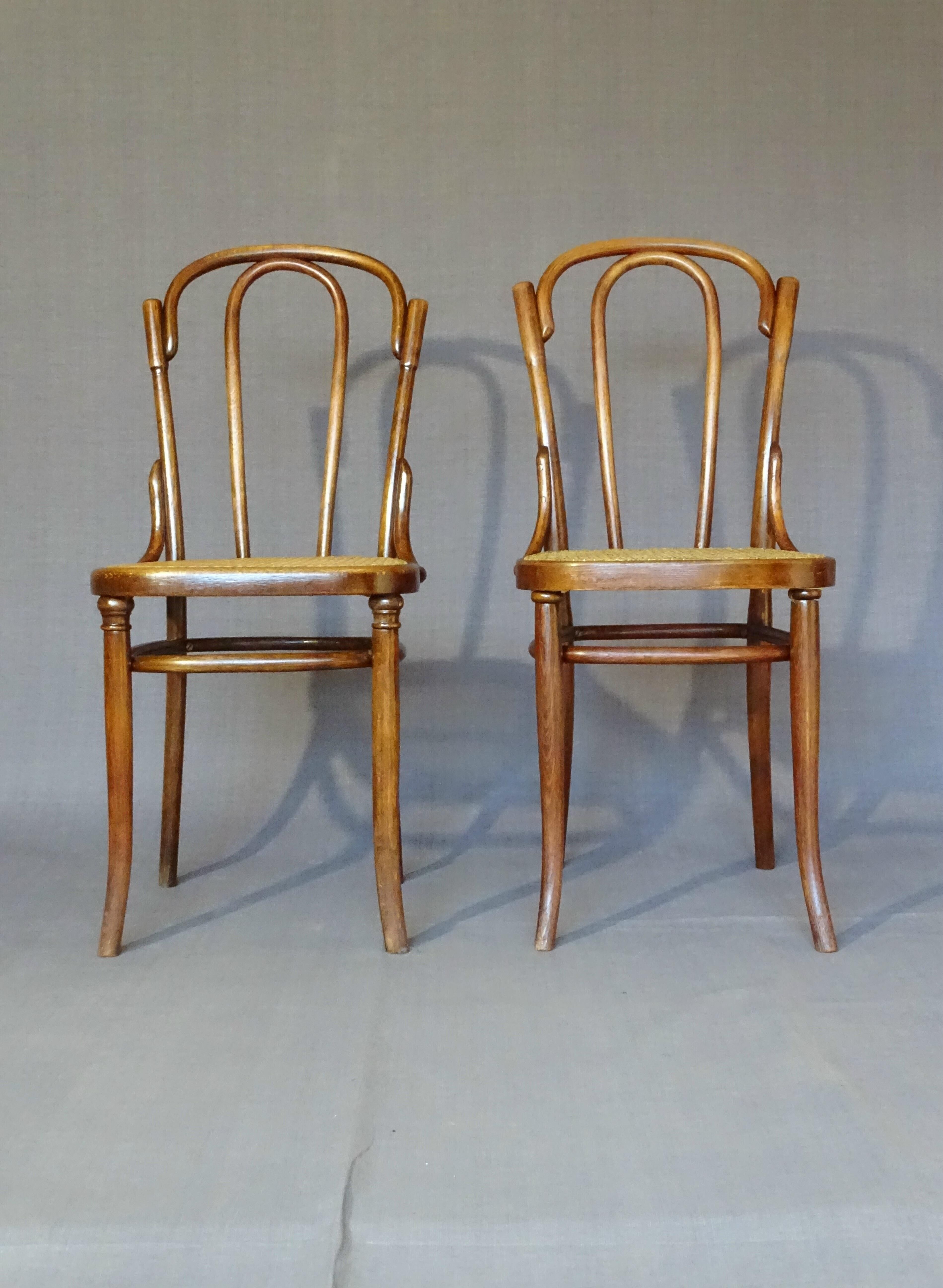 Fake pair of Kohn and Turpe tanned bistro chairs, circa 1900,