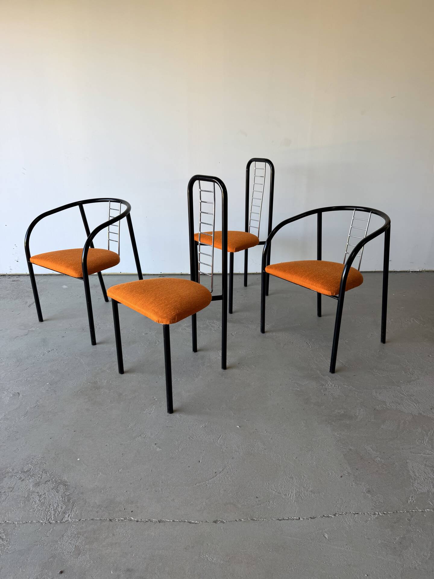 Set of 4 Italian design chairs in vintage black metal and chrome.