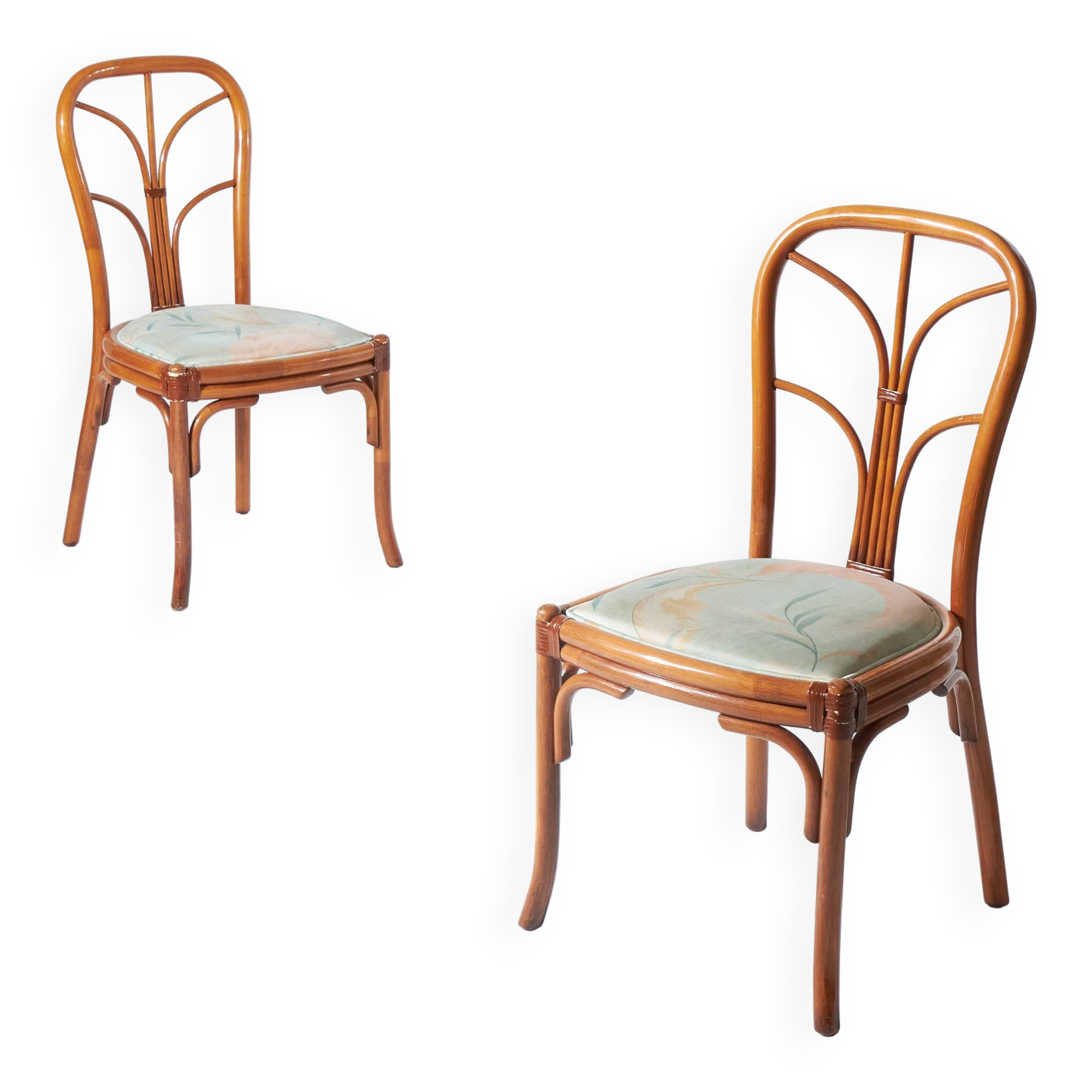 Pair of rattan and blue floral fabric chairs