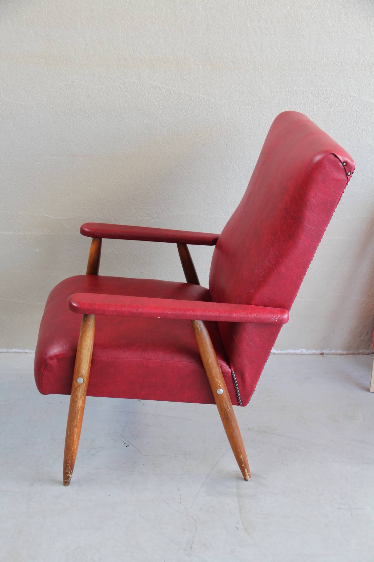 Fauteuil vintage en skaï rouge