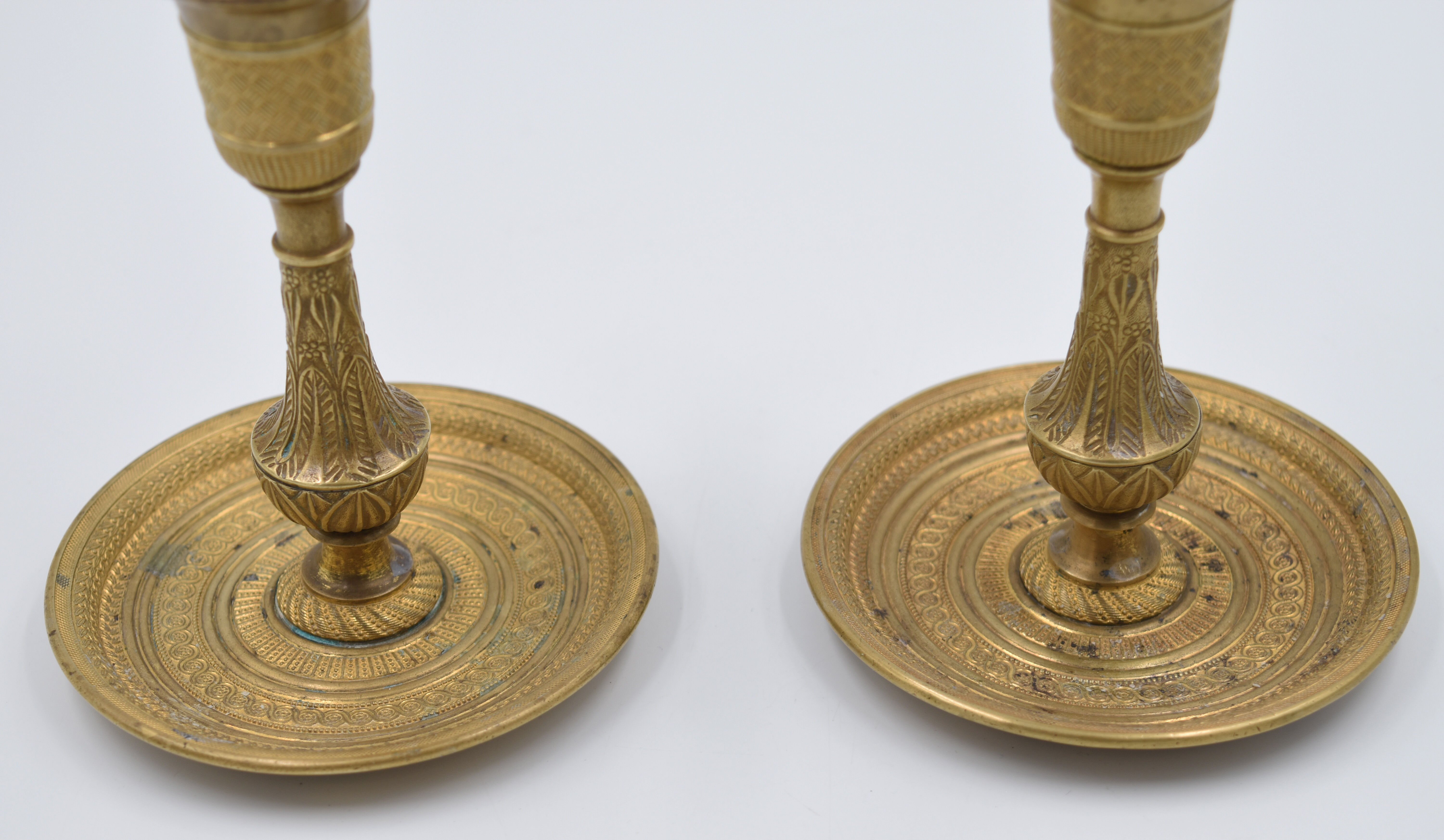 Pair of gossip candle holders in bronze and brass gilded period