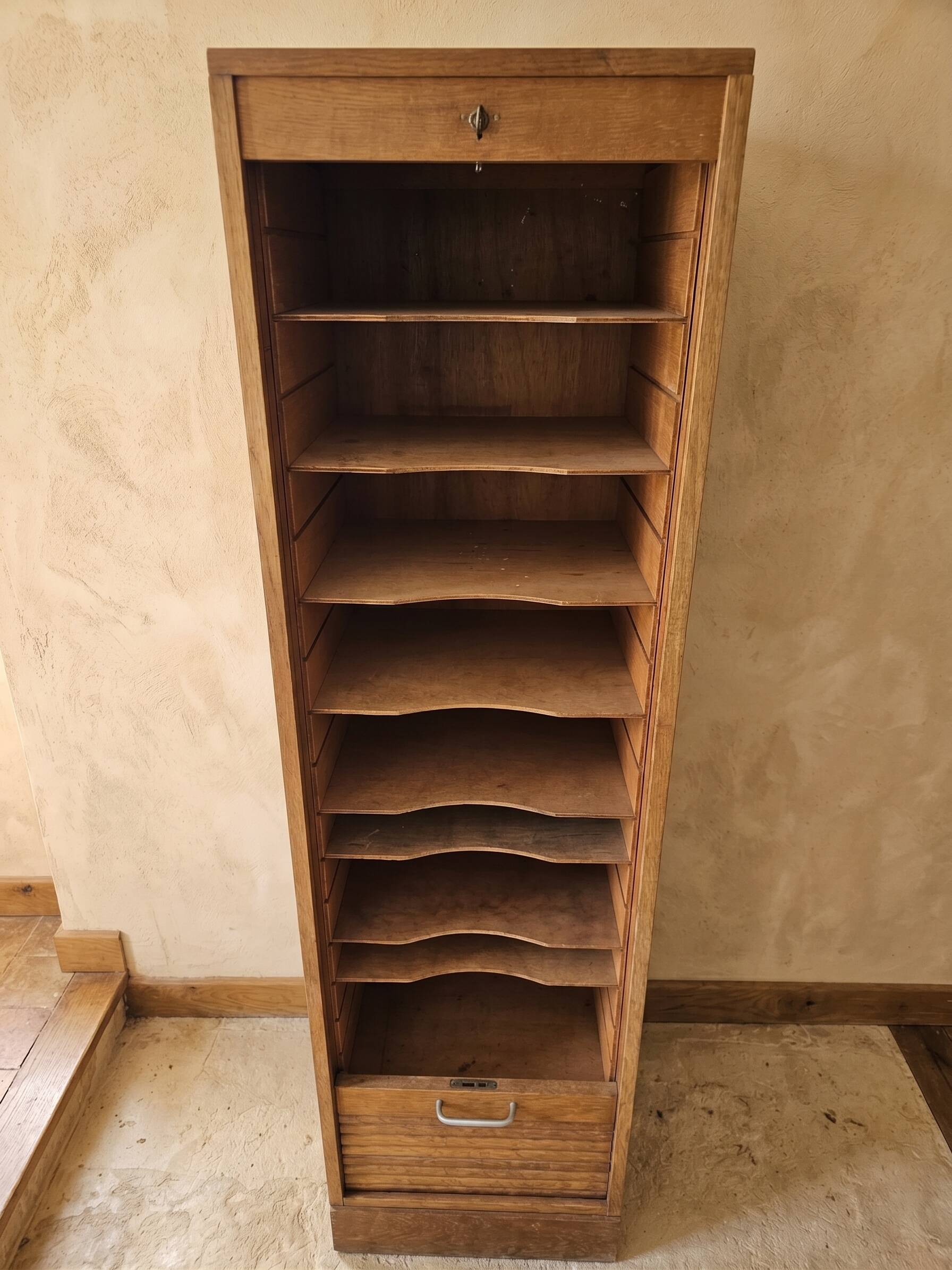 Wooden filing cabinet from the 1970s.