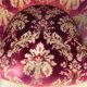 Velvet toad with backrest and firm seat in burgundy red color