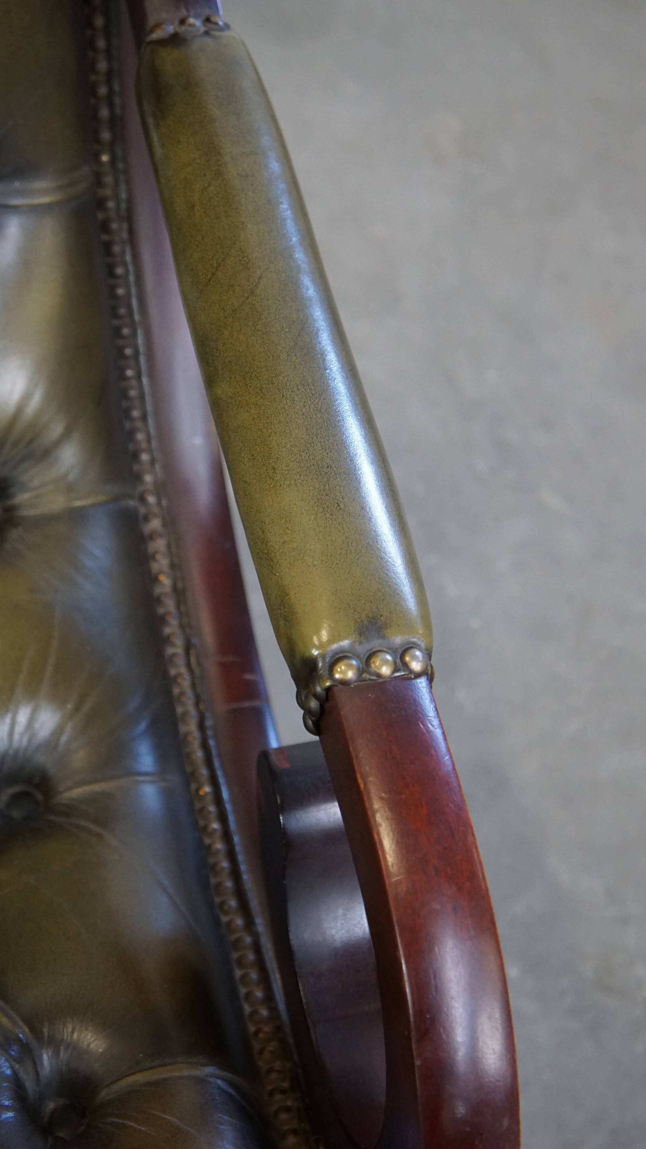 Green cow leather chesterfield armchair combined with wood