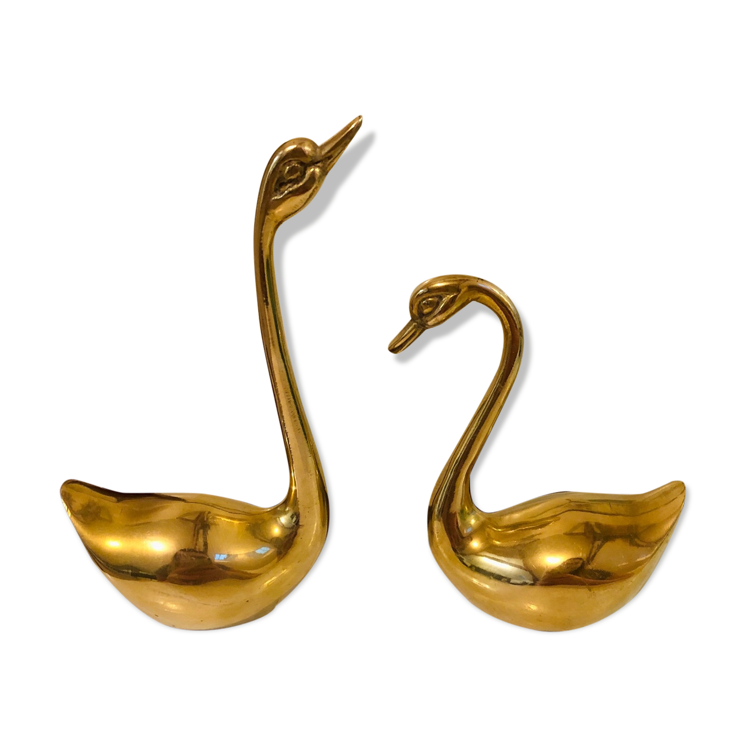 Brass swans