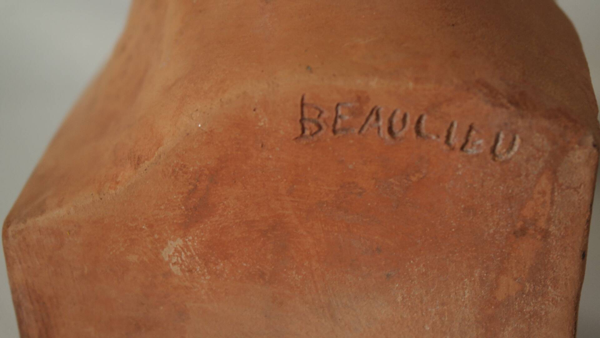 Ancient terracotta bust signed Beaulieu