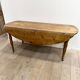 Louis Philippe wood dining table with shutters and casters