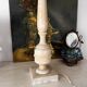 Antique lamp with a marble base.