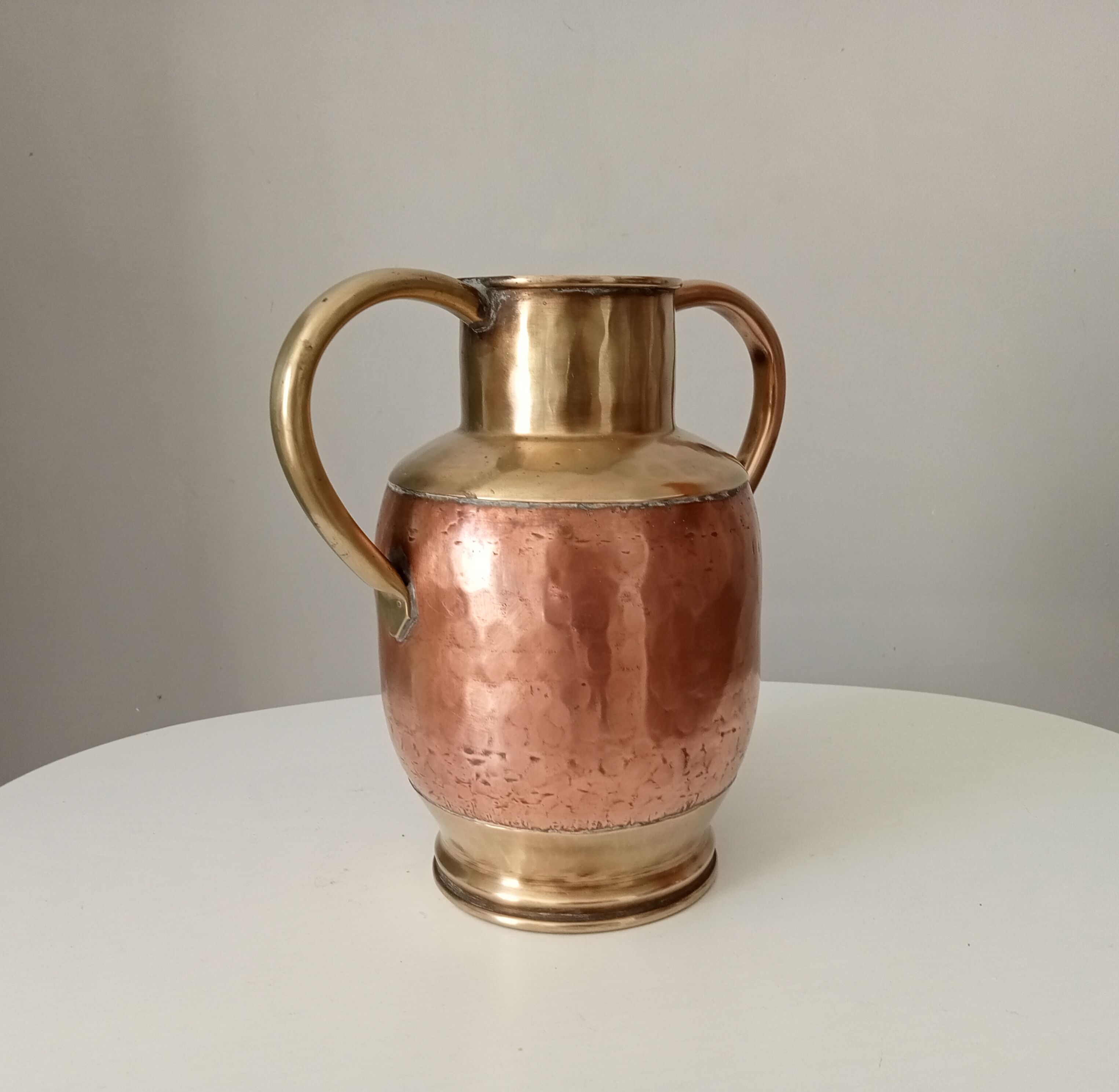 Antique amphora vase in brass and copper
