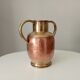 Antique amphora vase in brass and copper