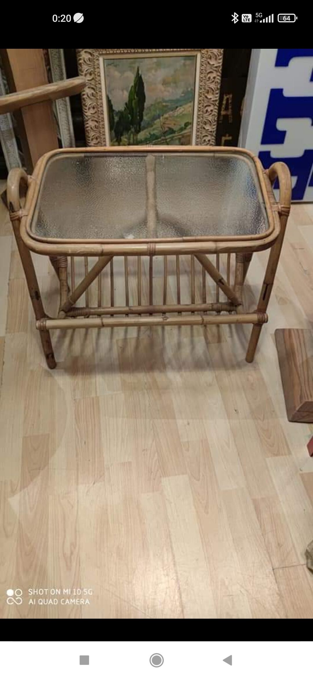 Rattan and frosted glass end table with magazine rack