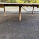 Renovated Louis Philippe round extendable dining table with 4 leaves.