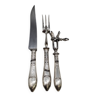 Set of silver-plated serving fork, knife, and meat fork.
