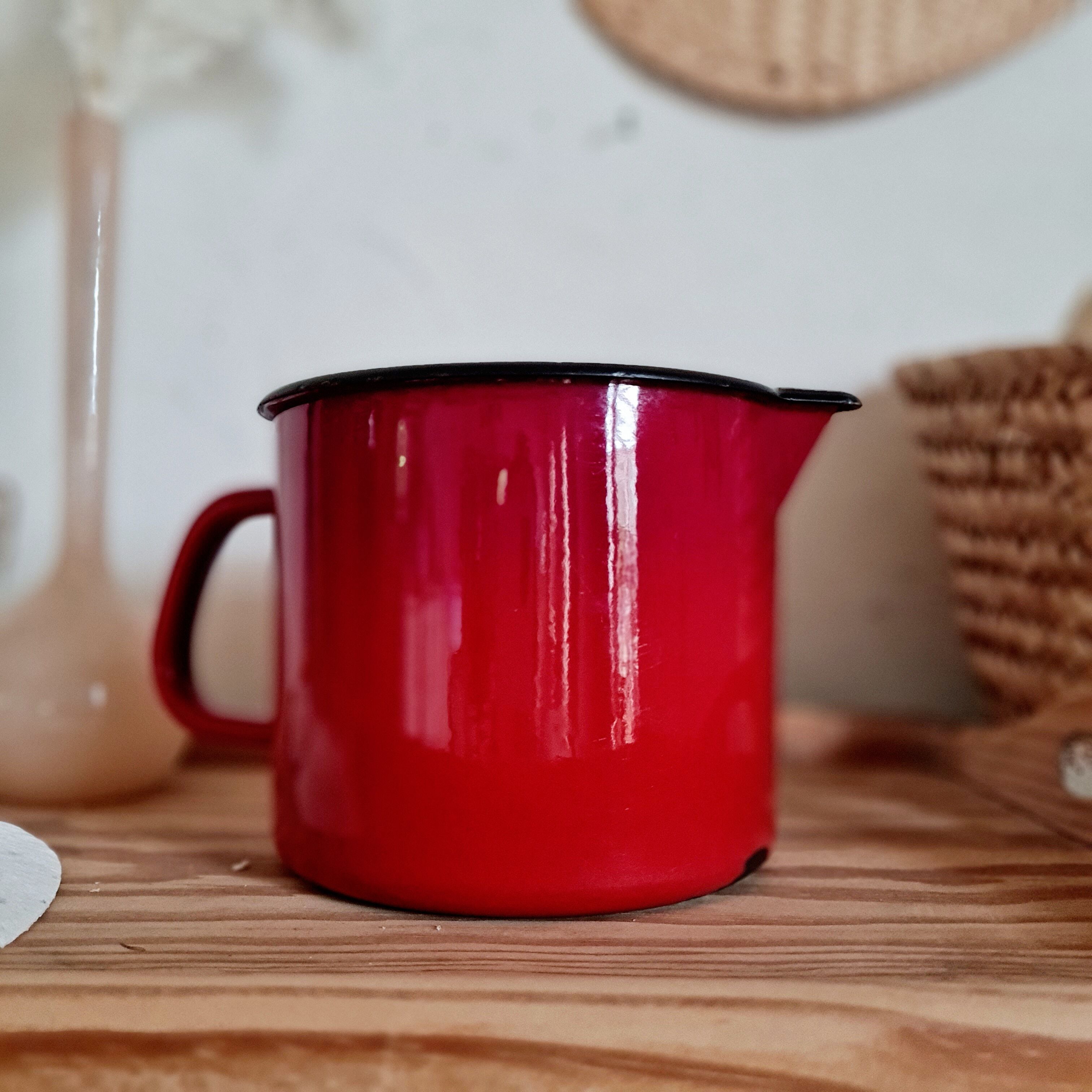 Pitcher vase in red enamelled sheet metal