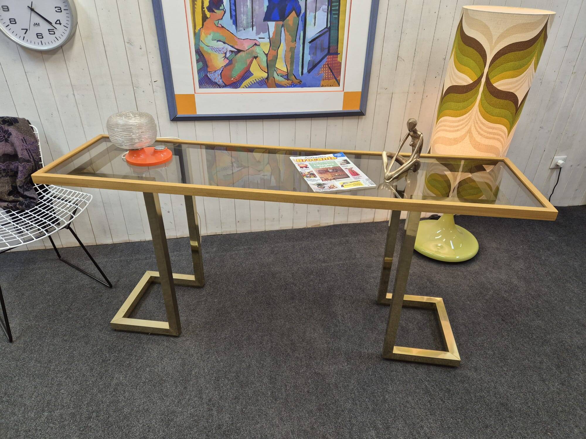 Vintage brass and smoked glass console.