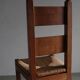 4 brutalist oak rush seat chairs | France | 1960s