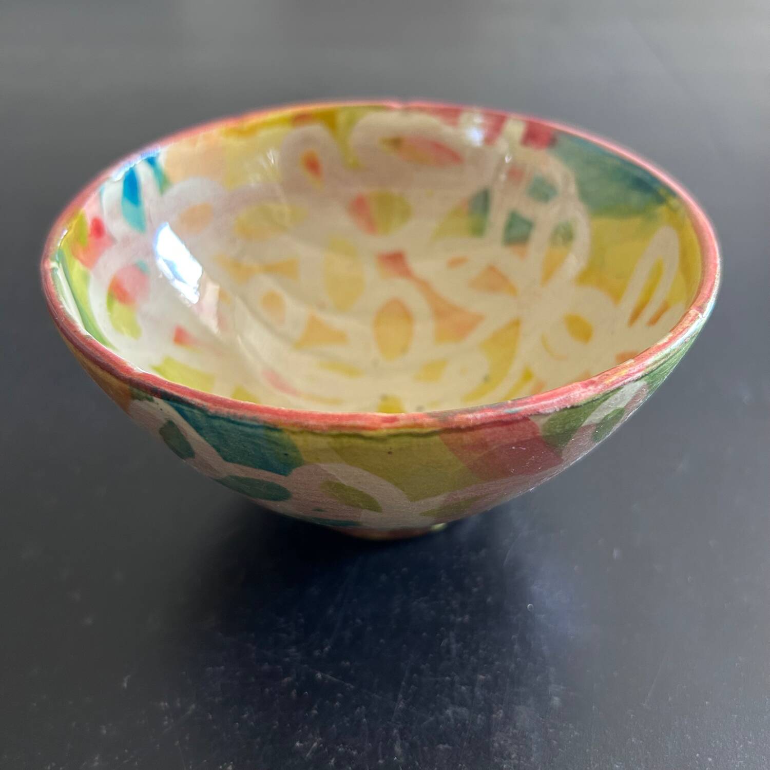 Signed bowl painted with stencil