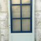 Double door facing a small tile