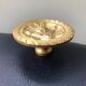 Large solid brass handle knob for door or furniture.