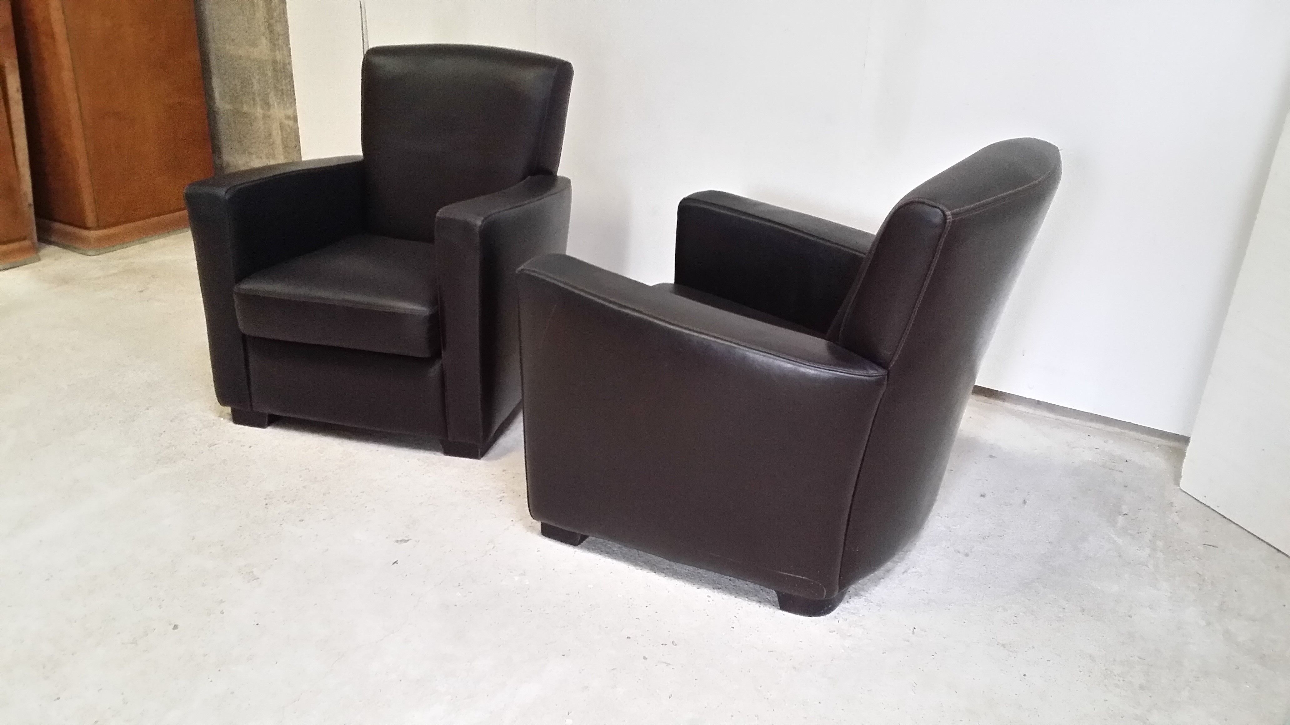 Pair of leather club armchairs
