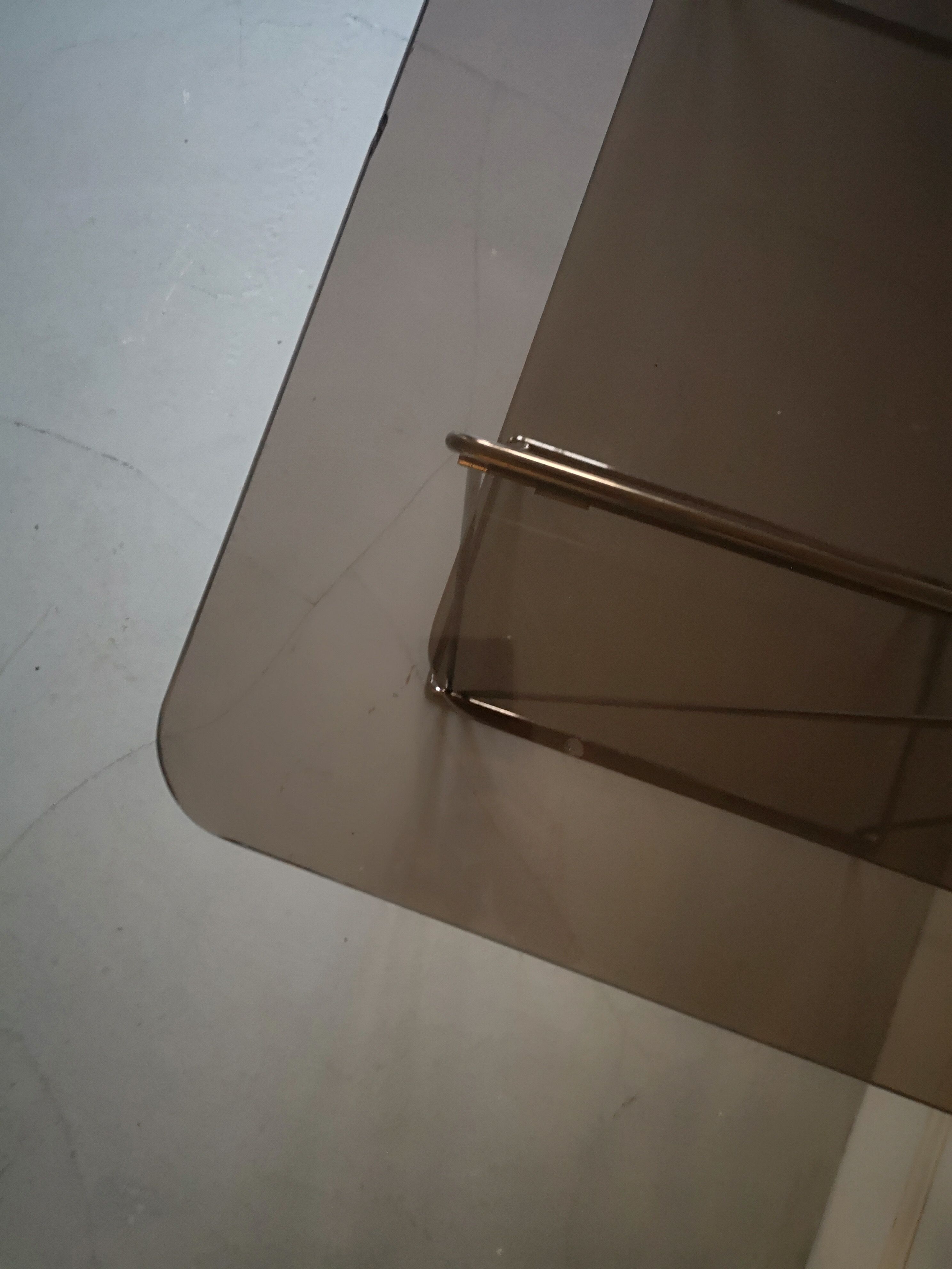 Design desk in smoked glass and wired metal
